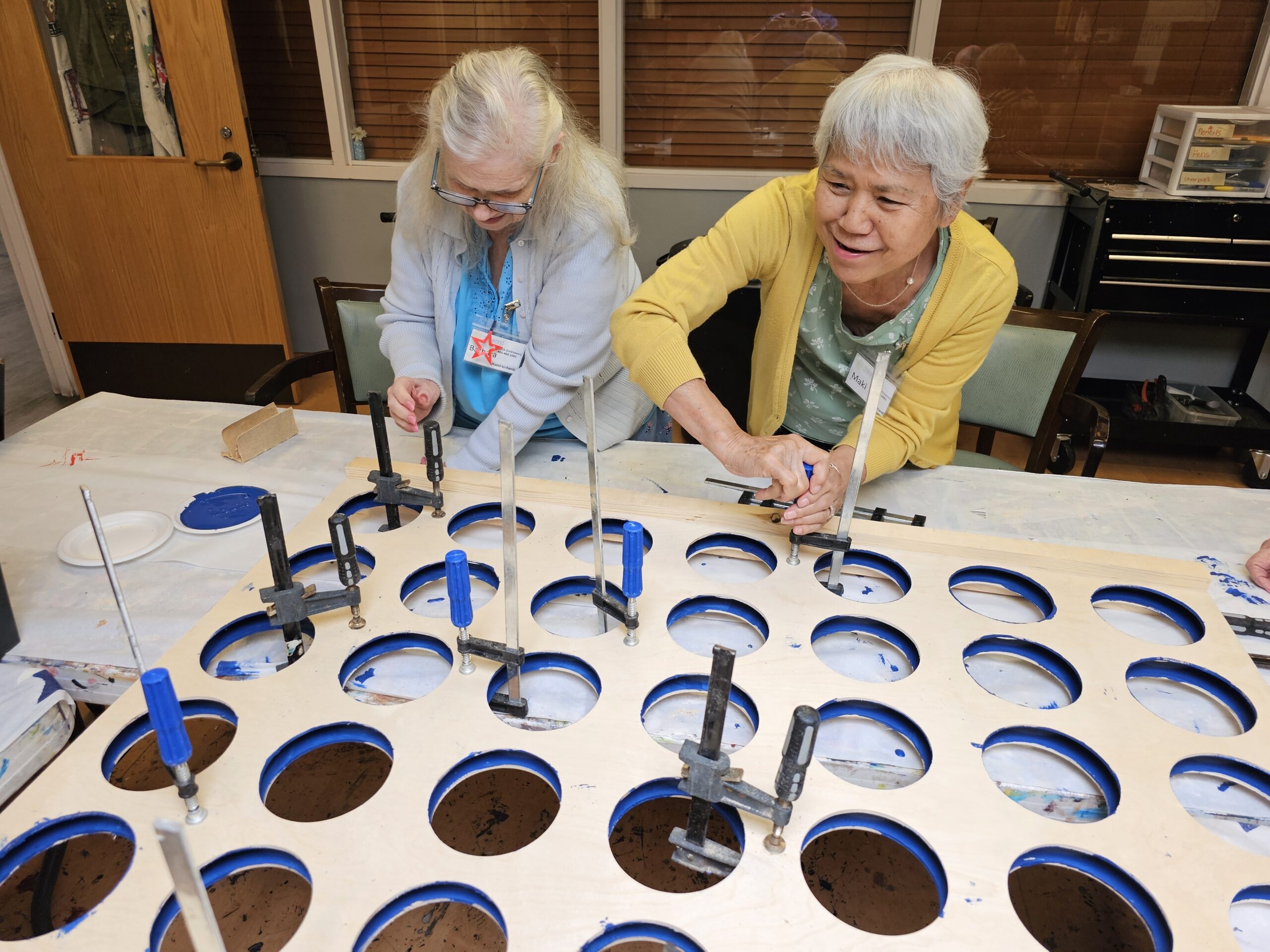 experienced woodworker connects older adults with dementia as a volunteer for Oakwood Creative Care